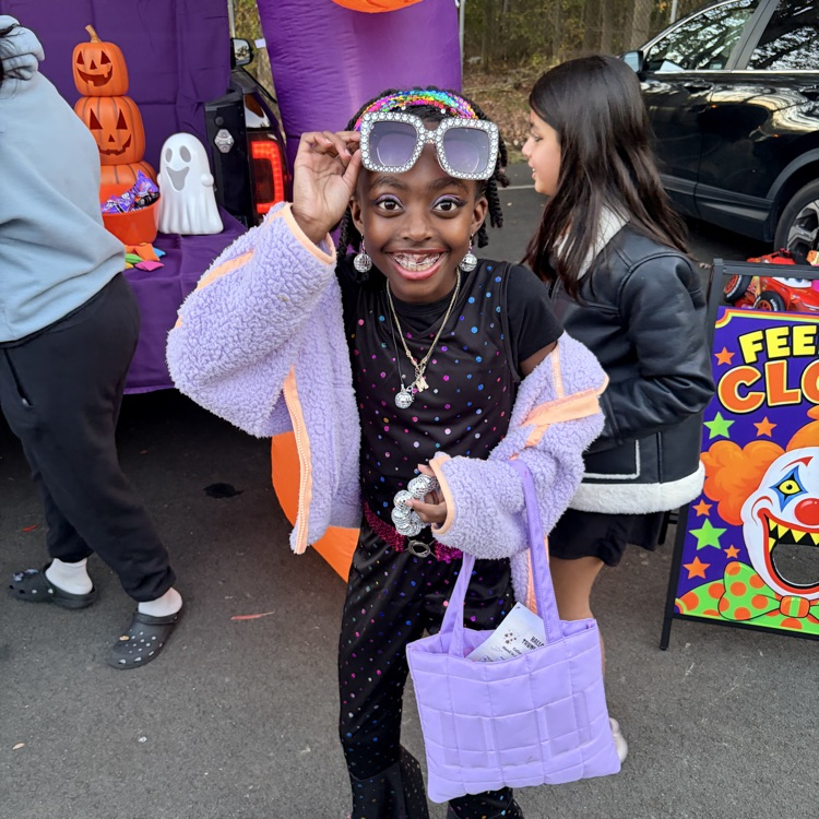 students at a trunk or treat event