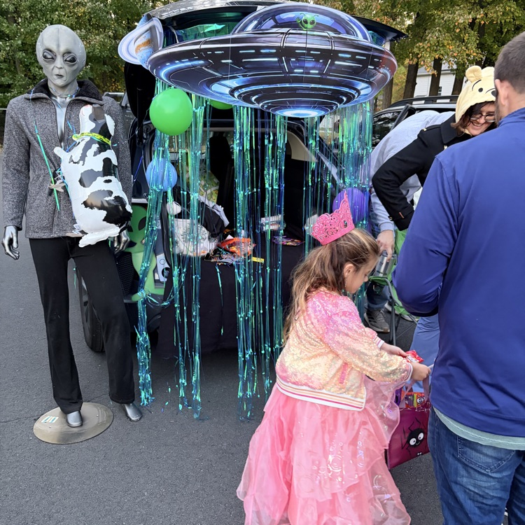 students at a trunk or treat event