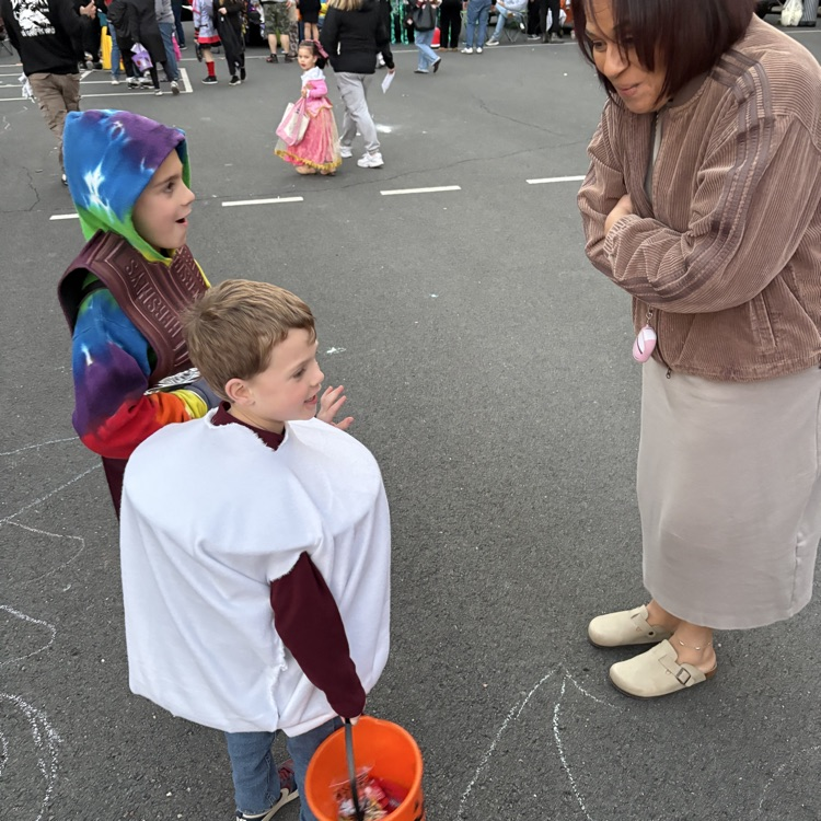 students at a trunk or treat event