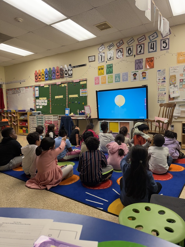 The class is doing a mindfulness activity