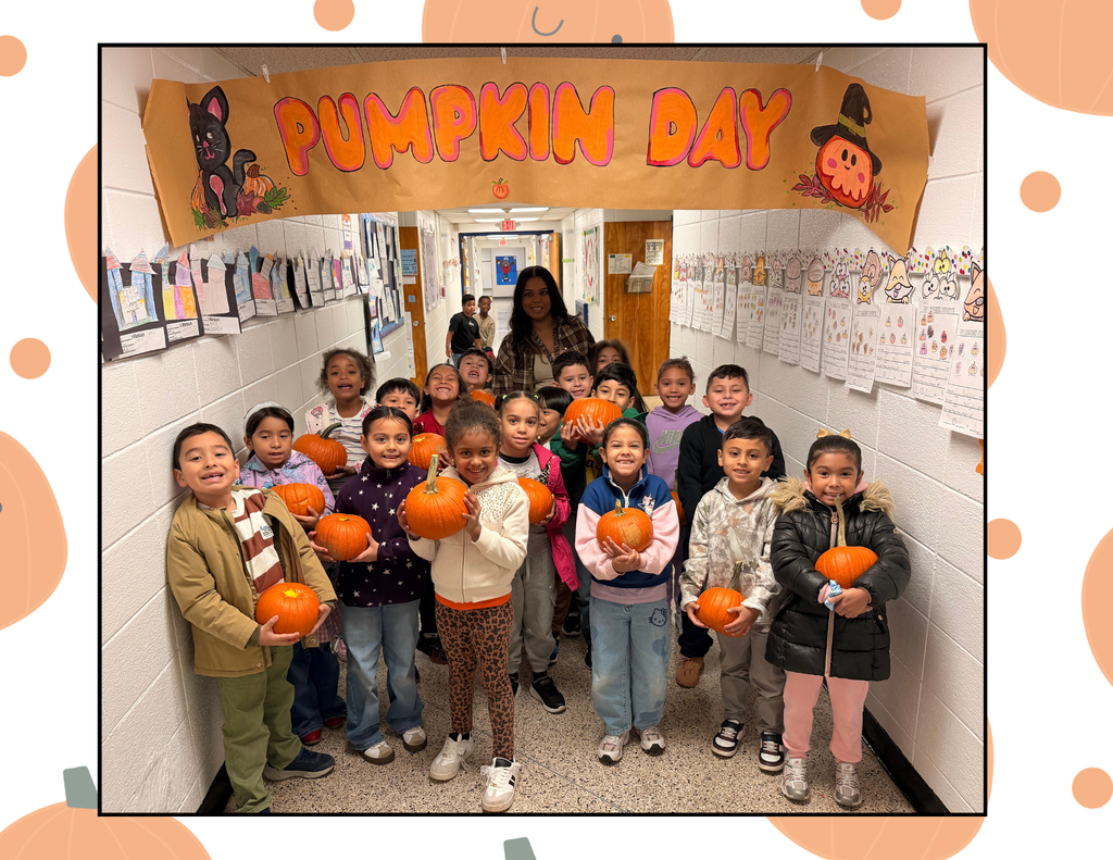 Students holding their pumpkins