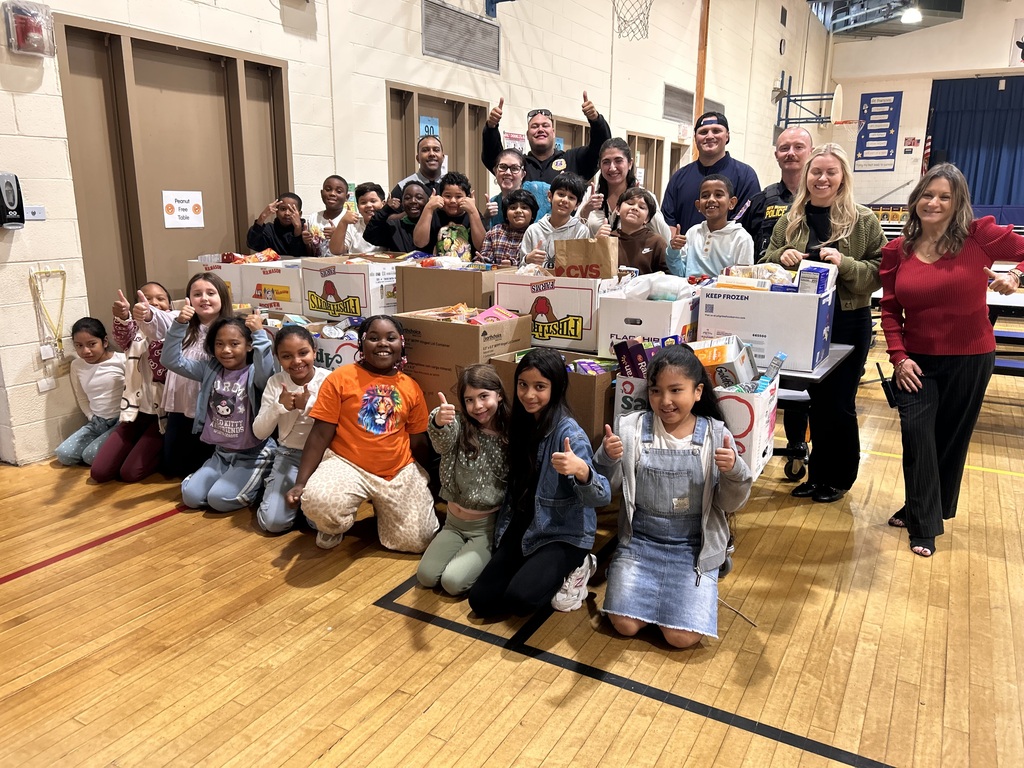 Students with boxes of canned goods 