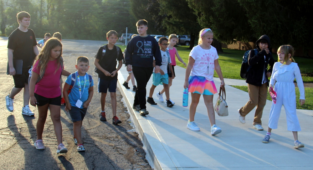 students walking to the school on the first day