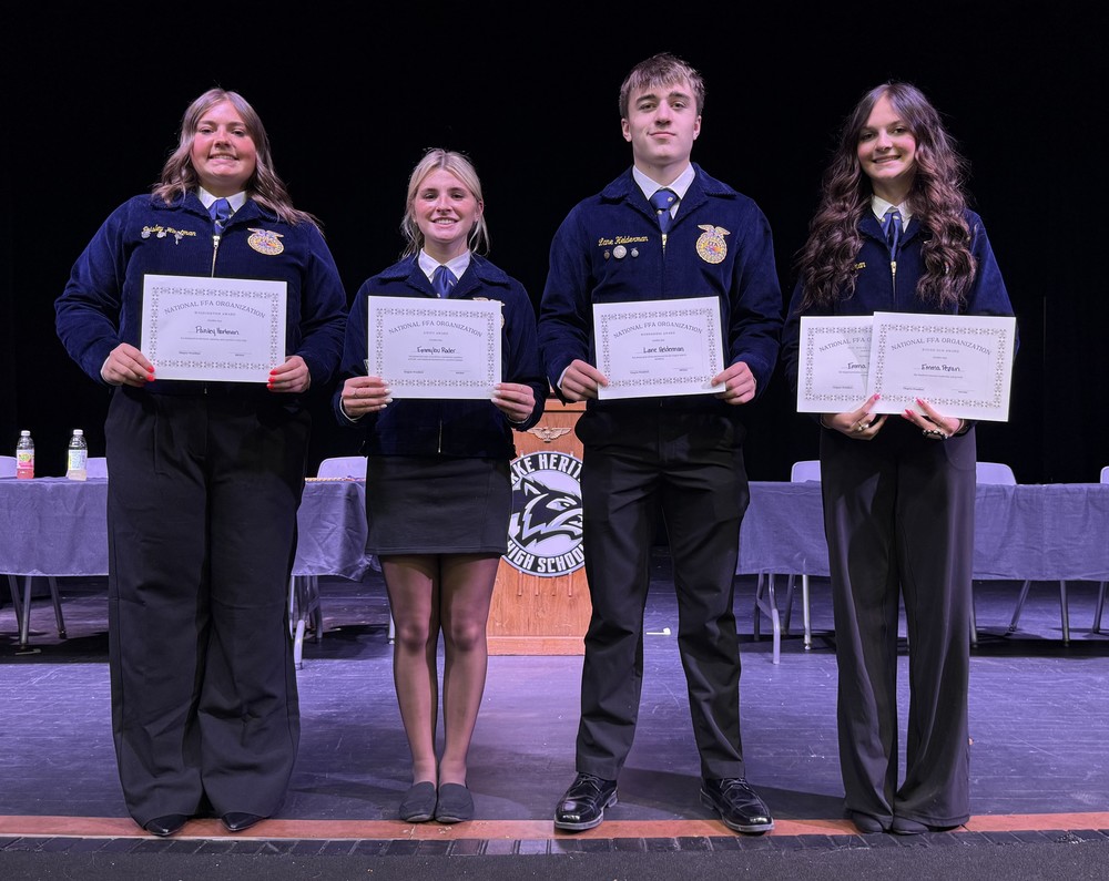 four fFA members holding certificates