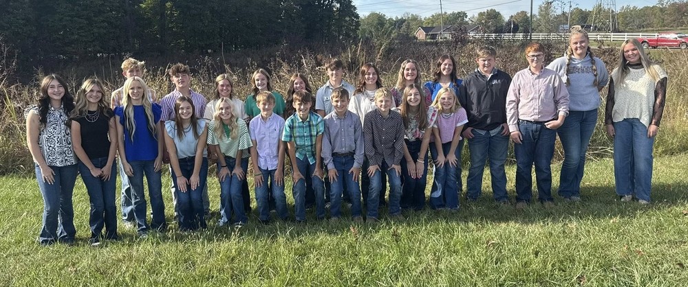 two rows of students standing or squatting for the livestock skillathon