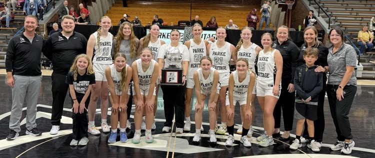 girls basketball players standing In two lines 