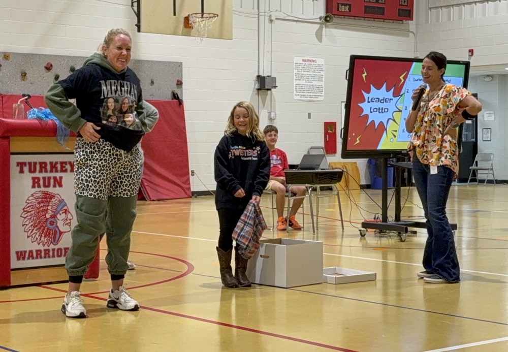 two teachers and a student demonstrating put first things first