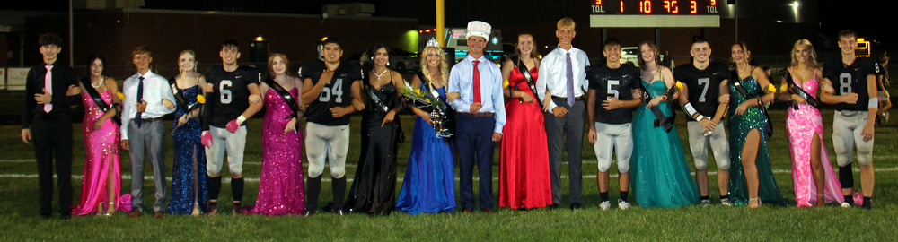 18 Homecoming Court members standing in a line