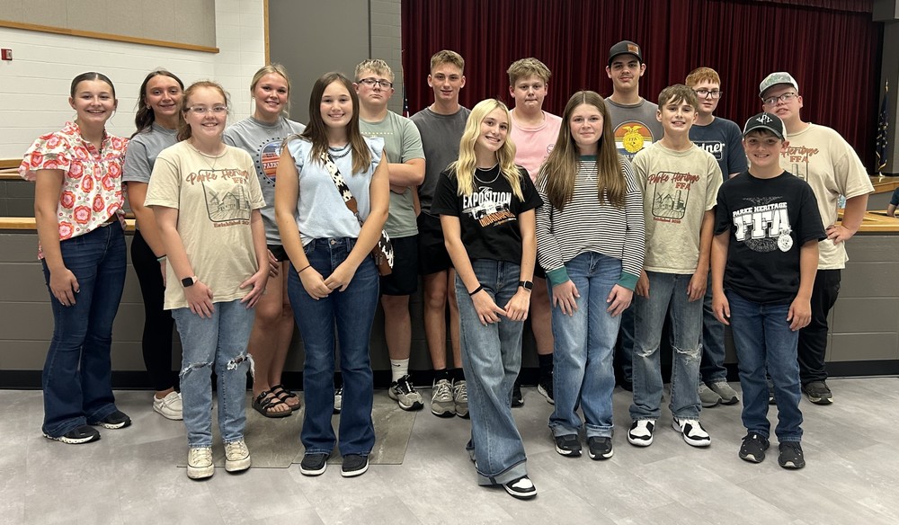 a photo of 15 FFA members who attended District Kickoff standing in two lines