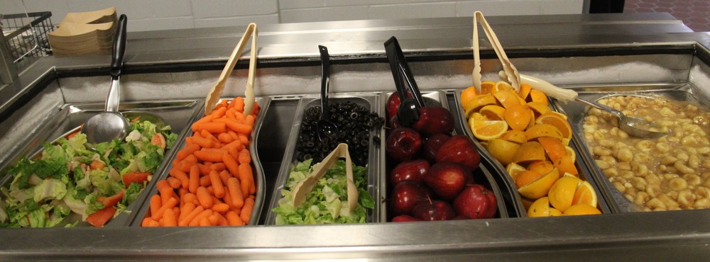 pans of fruits and vegetables