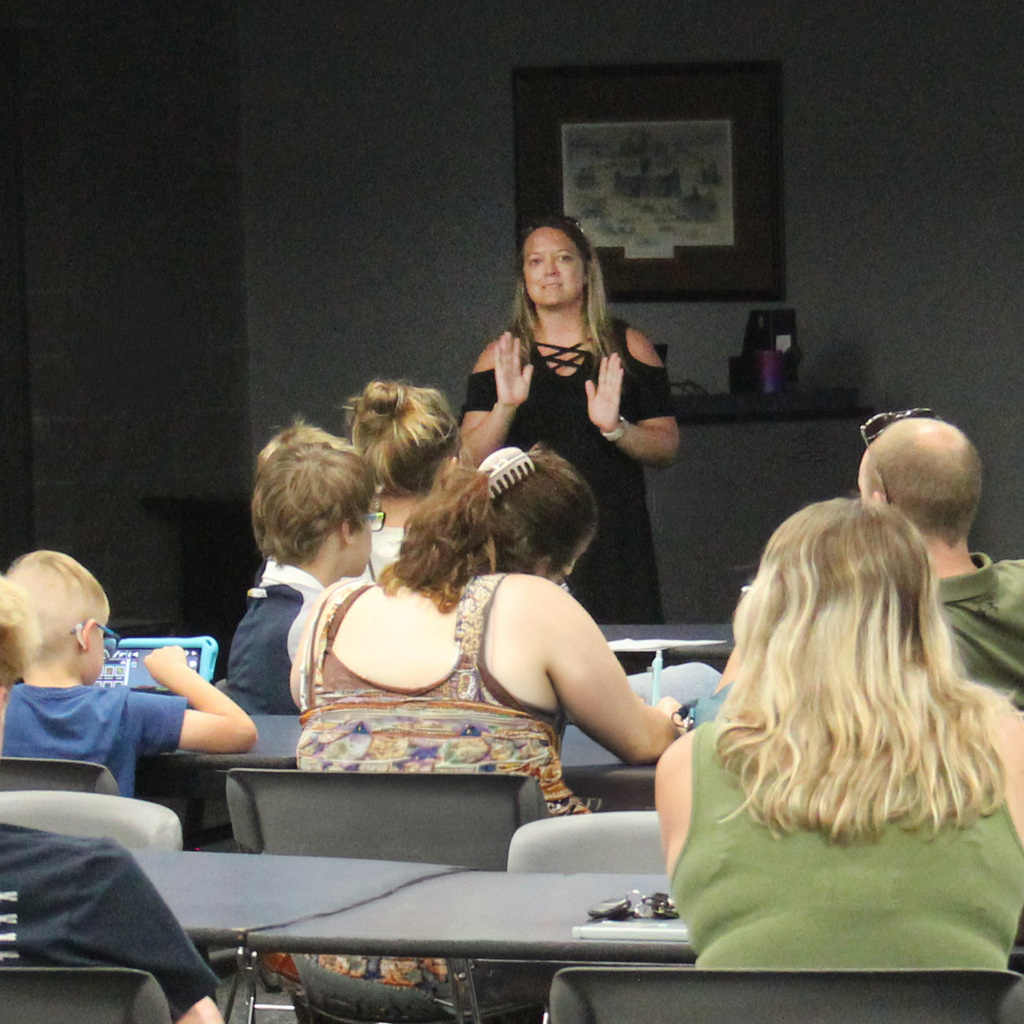 Photo of the Connect Academy Director presenting information about the upcoming school year.