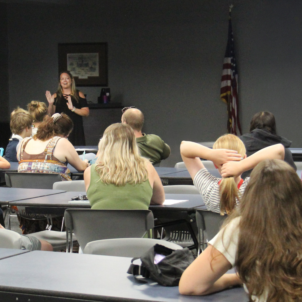Photo of the Connect Academy Director presenting information about the upcoming school year.