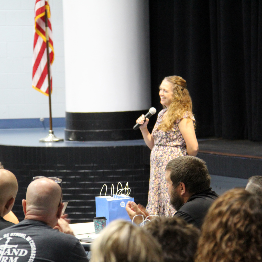 RES Principal speaks to colleagues during the back to school staff meeting.