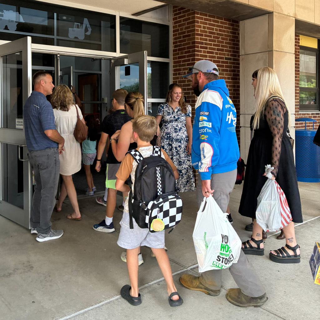 Students and parents entering the school for Back to School night at the Elementary.