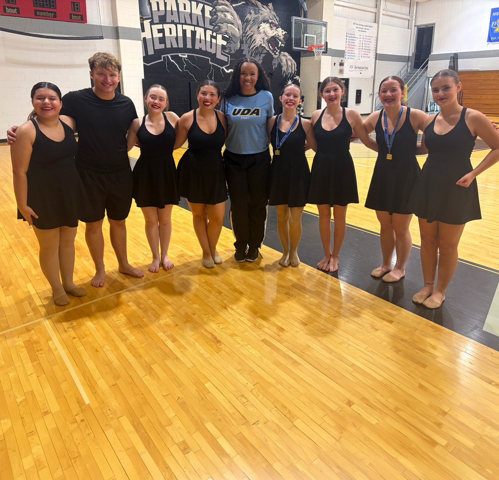 Parke Heritage High School Dancers posing for a photo with their UDA Coach.