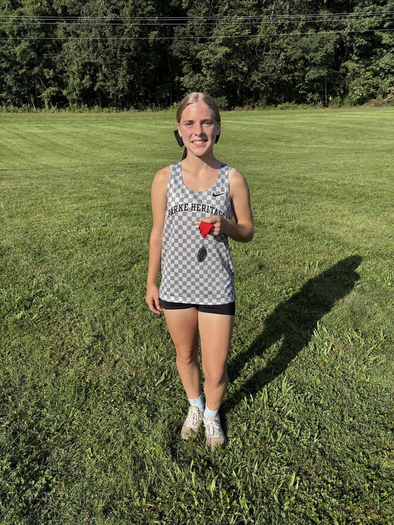 Parke Heritage 2nd place Cross Country Winner posing for a photo at the Attica Invite.