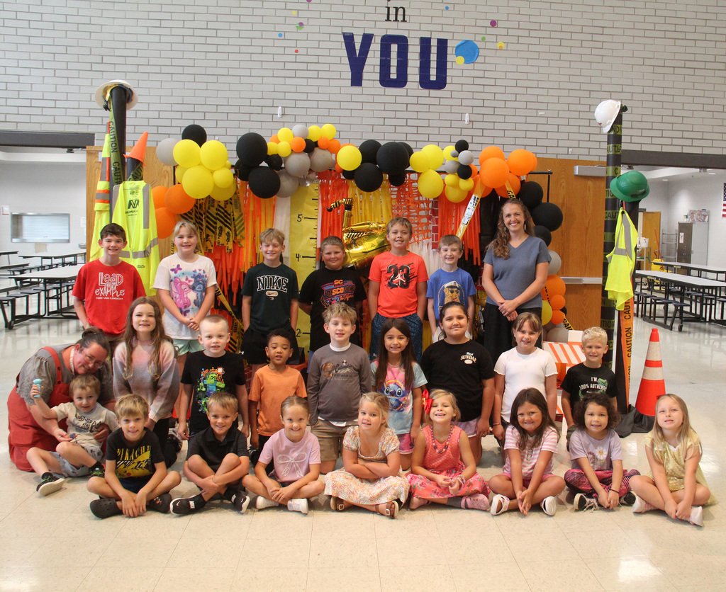 Students posing for a photo that were selected for Character Builder Awards that demonstrate a growth mindset.
