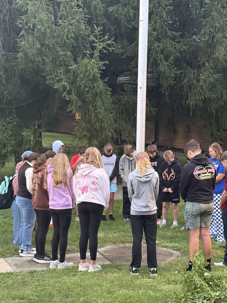 Parke Heritage Middle School Students gather around the pole to pray for annual global day of See You at the Pole.