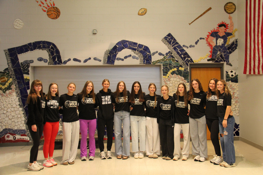PHHS Volleyball Team poses for a photo inside the Rockville Elementary School. 