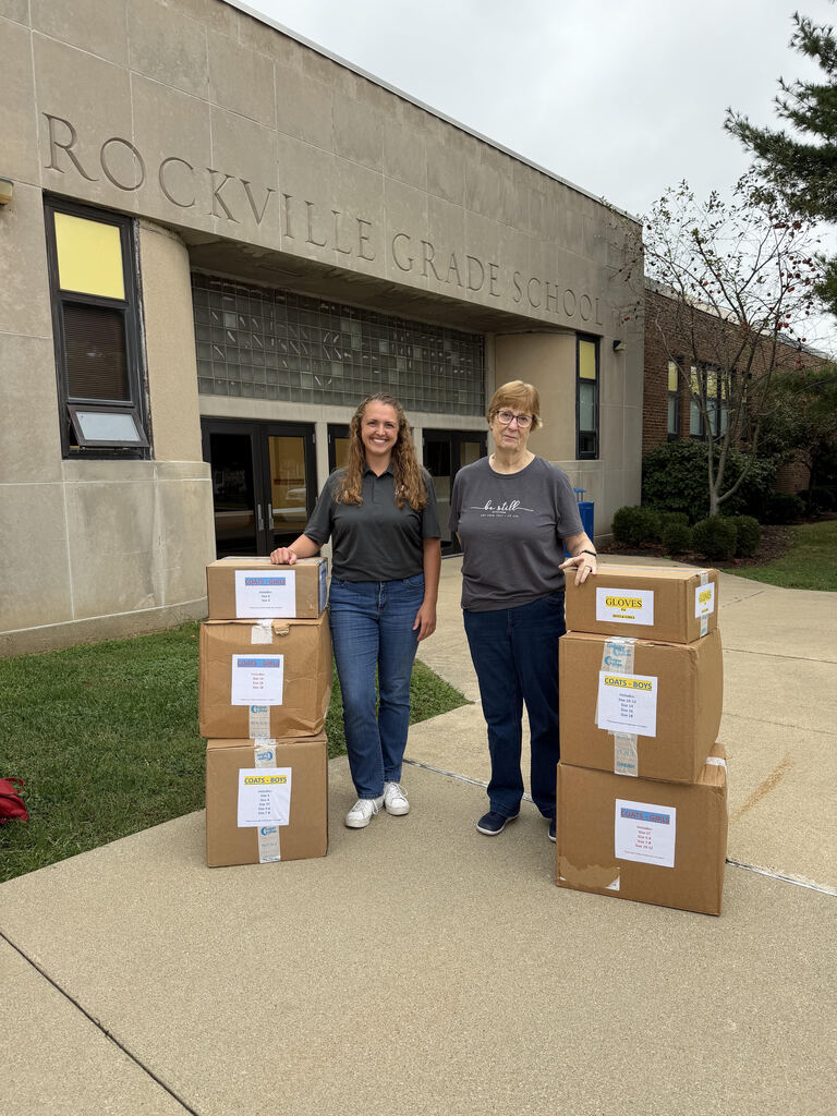 Mrs. VanDeusen and Lee Ann Aronson, who donated coats and gloves to RES Friday for RES Students.