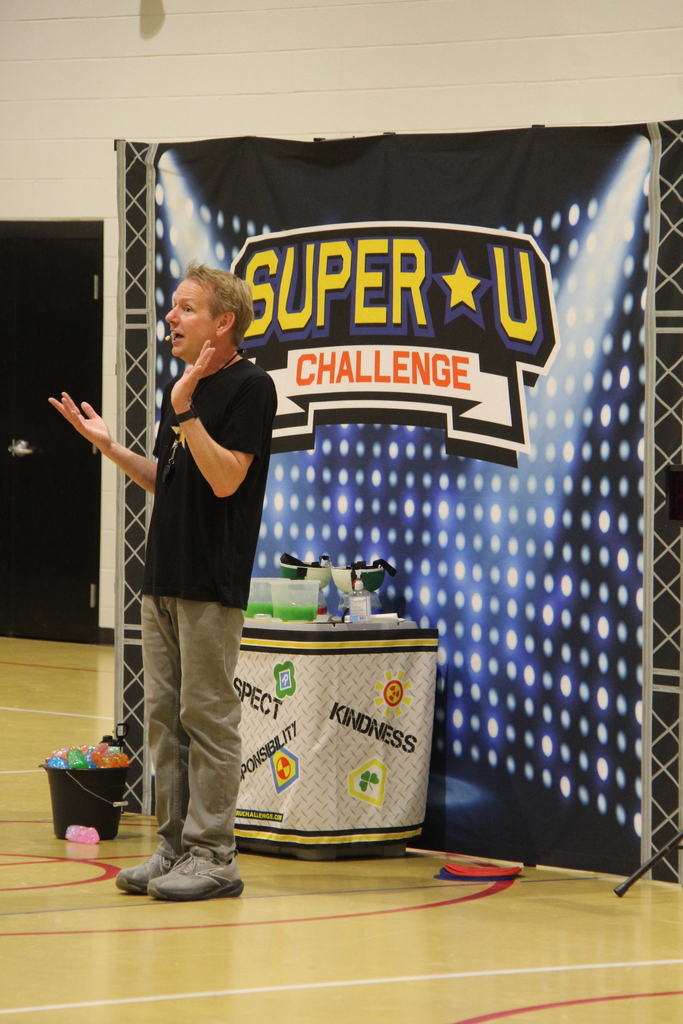 Super U speaker, speaking to the students about being kind. 