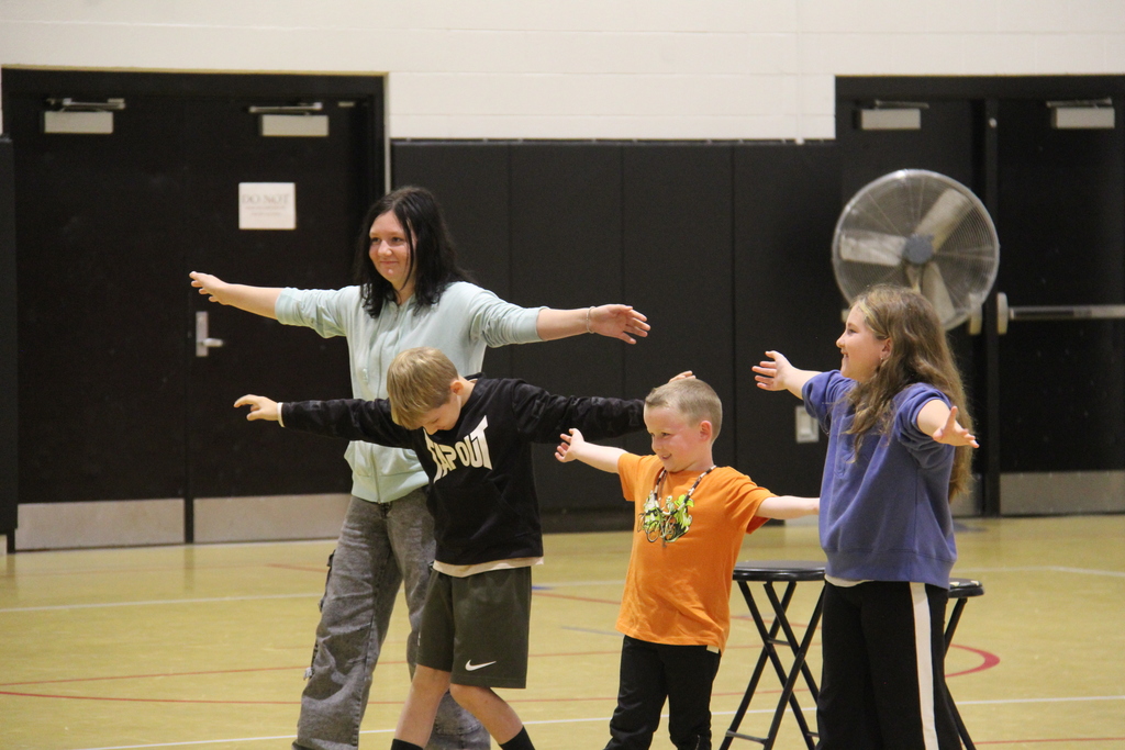 Students doing their best Super Hero Pose after their competition. 