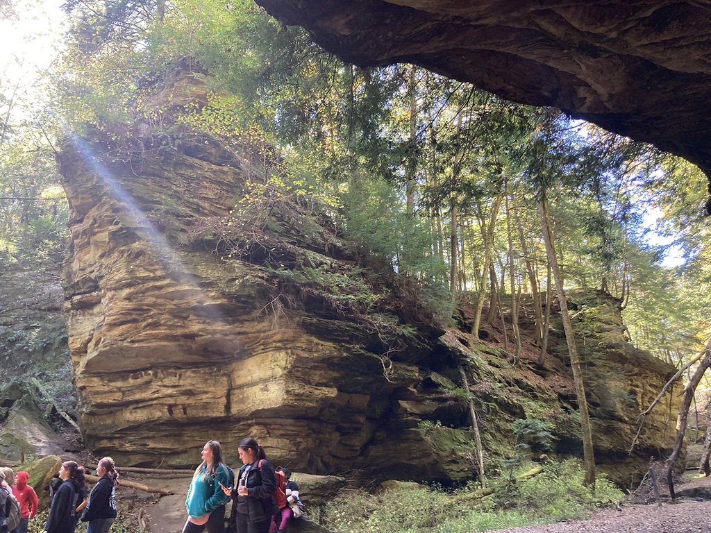Students and parents with the Rocky Hollow Rocks in the background.
