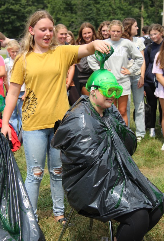 a student sliming a teacher