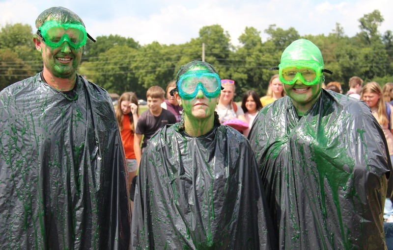 three staff members after being slimed