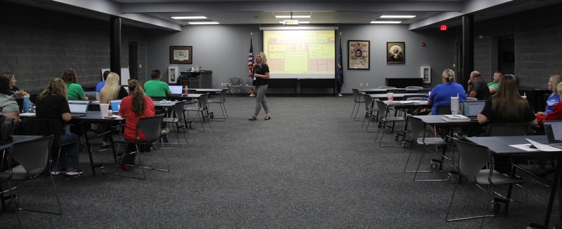 middle school teachers listening to a workshop speaker