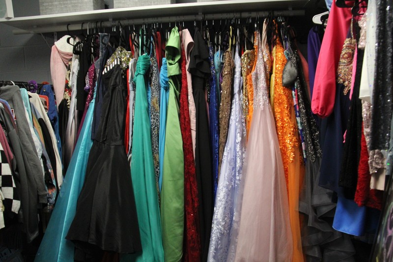 racks of prom dresses