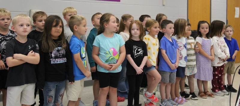 kindergarten students standing in two rows