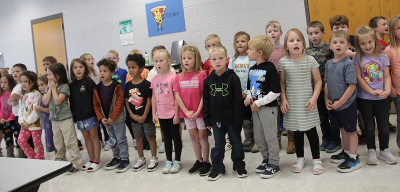 kindergarten students standing in two rows
