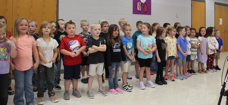 kindergarten students standing in two rows
