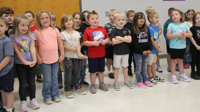 kindergarten students standing in two rows