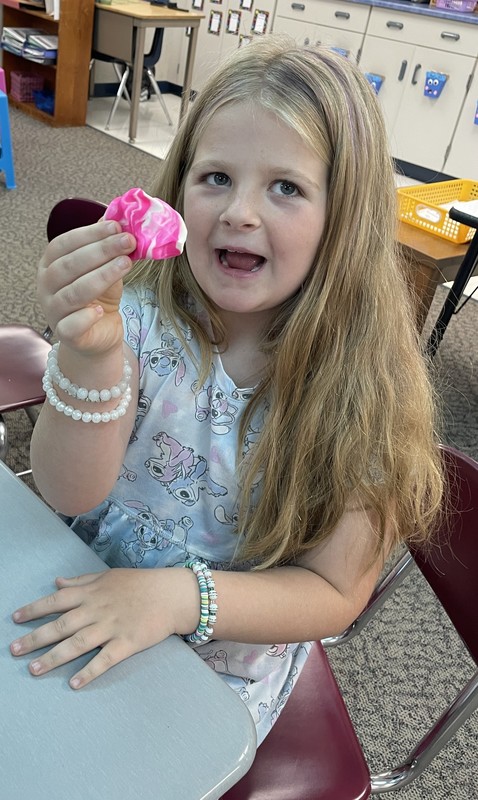 student playing with Play-Doh