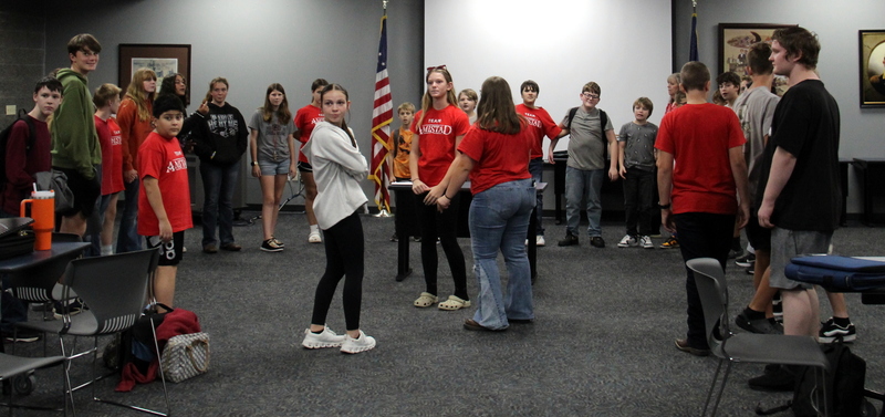 students standing in a circle