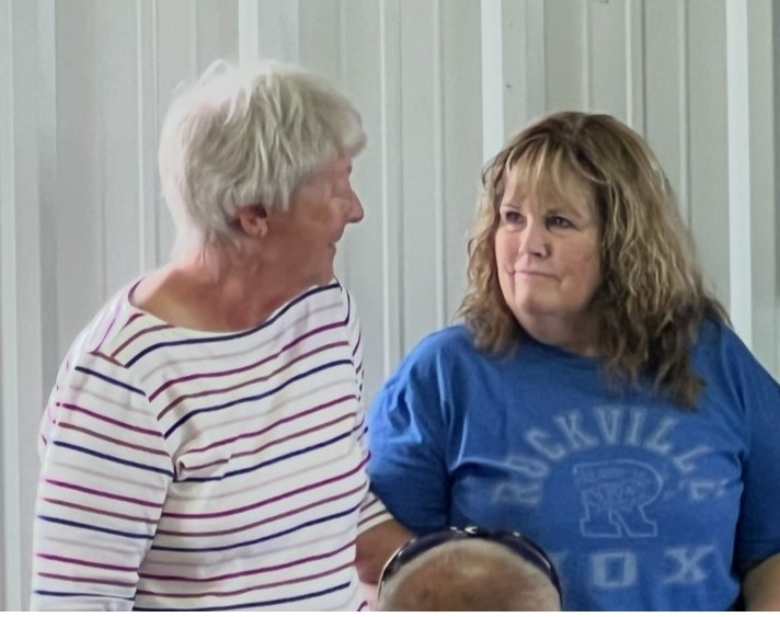 two women looking at each other