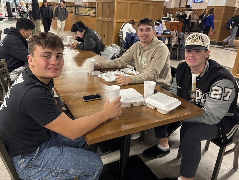 students eating lunch at one of the food courts