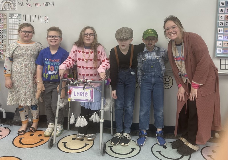 students and staff dressed up as 100-year-old people