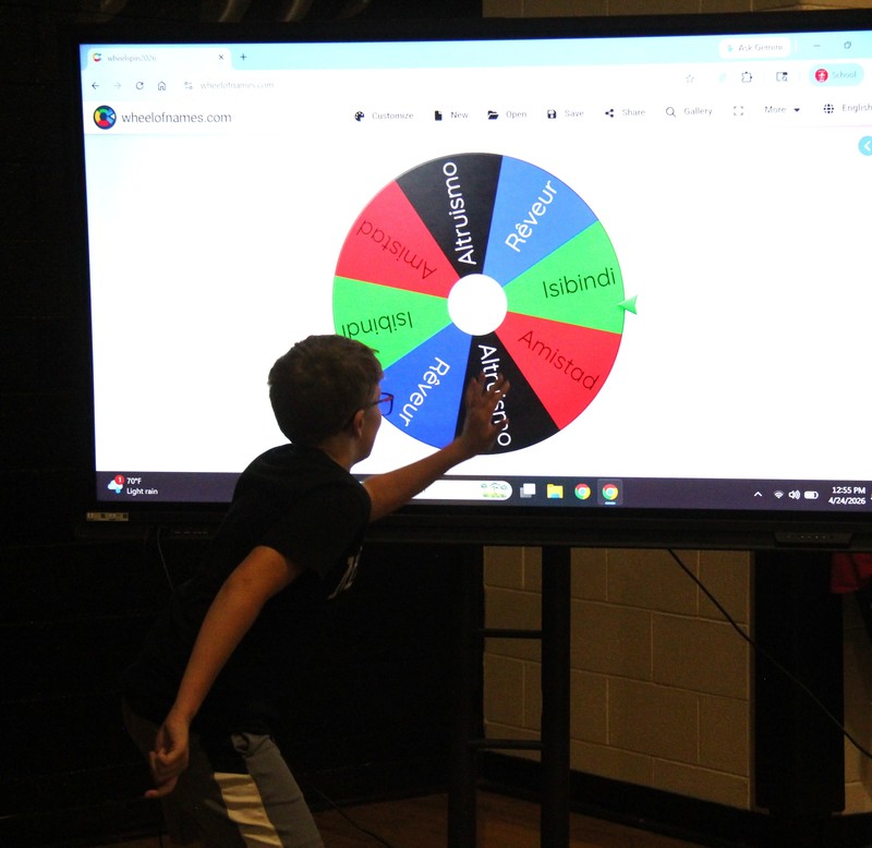 student spinning the wheel