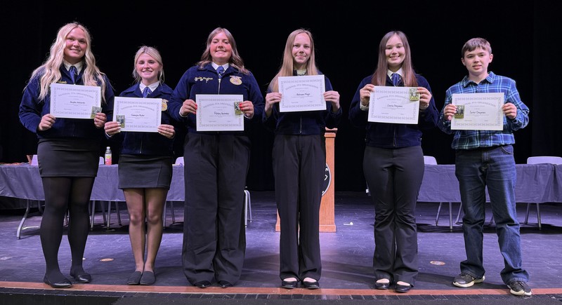 six FFA members holding certificates