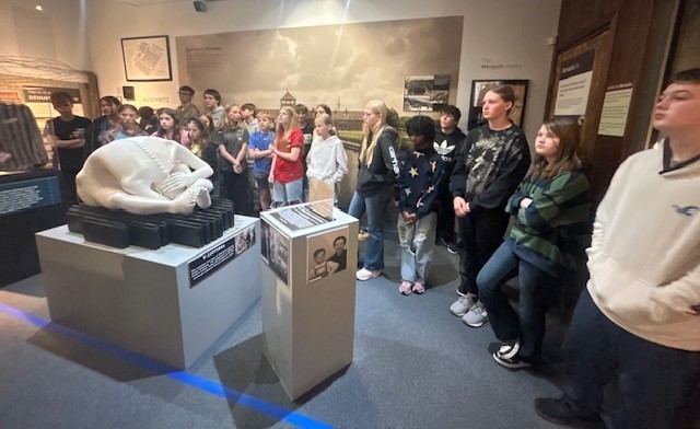 students looking at an exhibit