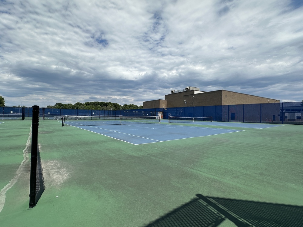 An image of tennis courts outside of Shaker High School.