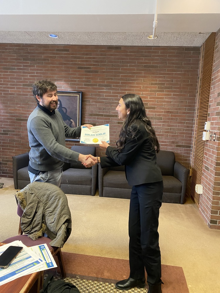 A student receives an award.
