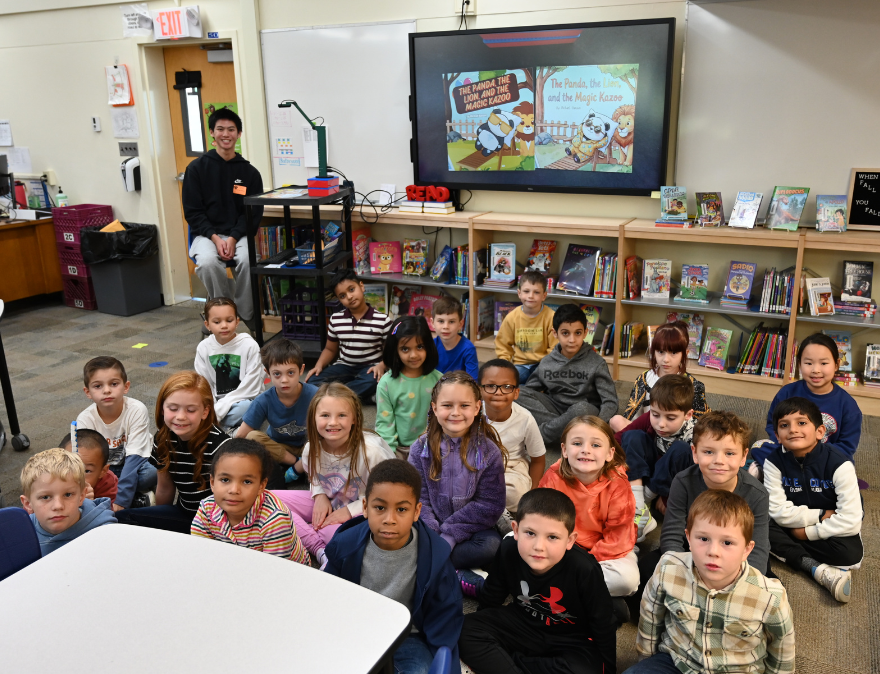 Shaker High School junior Michael Banson visited a second-grade class at Latham Ridge Elementary School