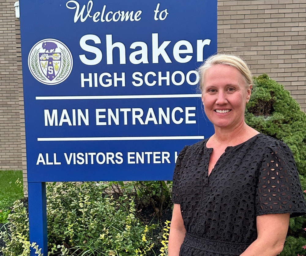 Nicky Bogert photo in front of SHS sign