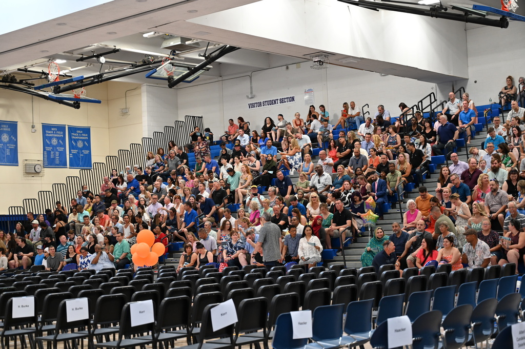 Family and friends watching graduation