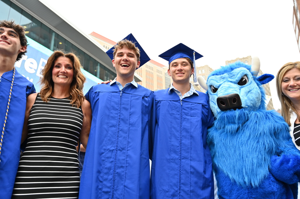 The Bison gets in on a family photo.