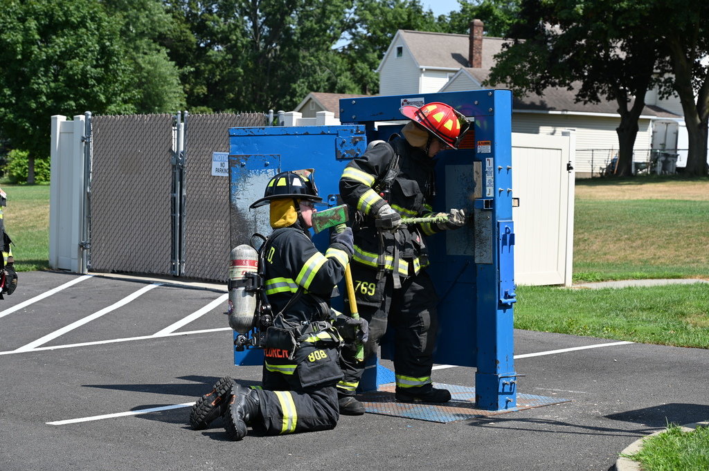 Boys breaking open door